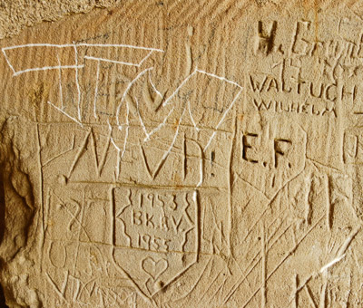 Postwar graffiti: lovers in 1953, a recent scrawl